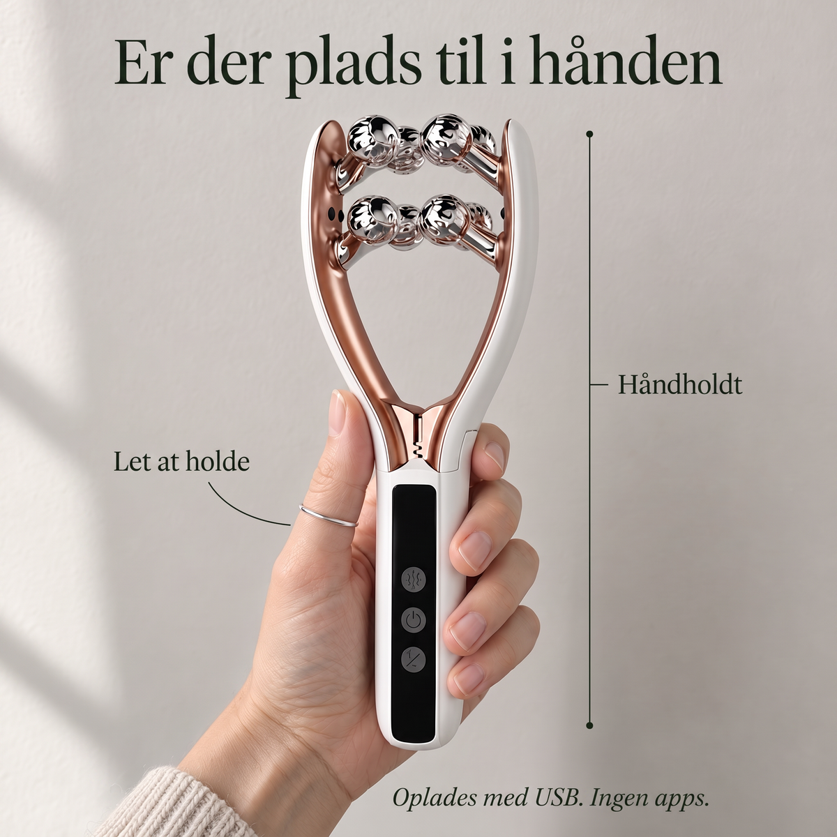 Hånd holder Kæbero mod væggen for at vise, at den kan være i hånden