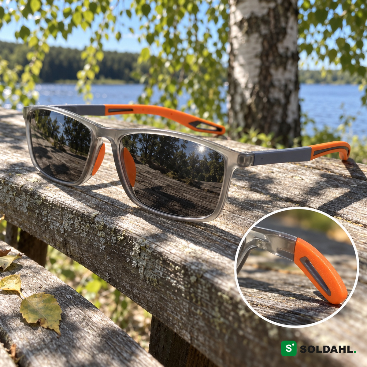 Bytfri med mørke fotokromatiske glas i sollys på en træbænk