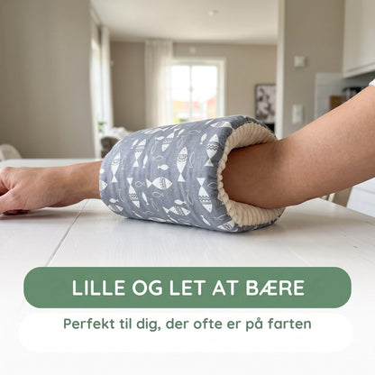 Armpuden på underarmen, lille og let at have med
