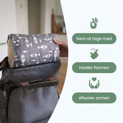 Armpuden kan være i pusletasken og holder formen