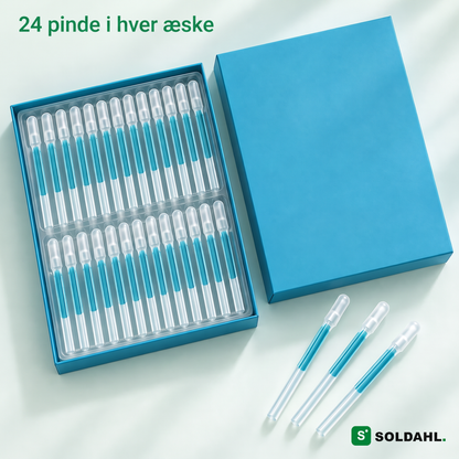 Åben æske med 24 pinde i bakke og tre løse pinde, teksten 24 pinde i hver æske